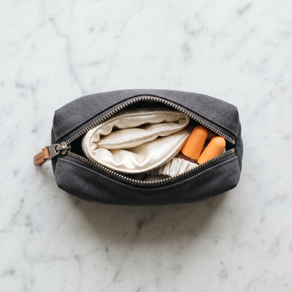 DriftKit travel sleep essentials organized in a compact pouch