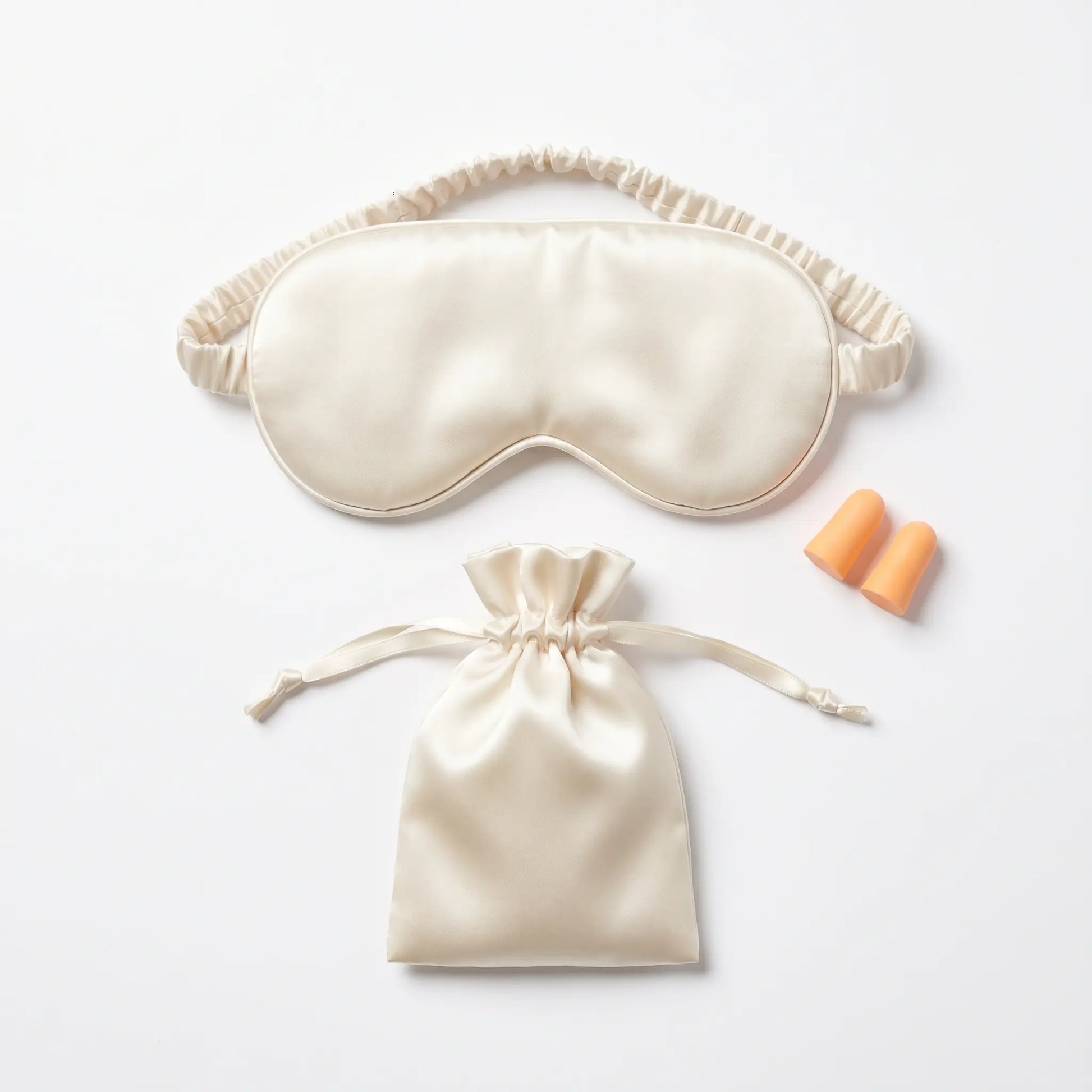 Champagne Beige DriftKit Travel Sleep Kit with soft sleep mask, earplugs, and compact pouch