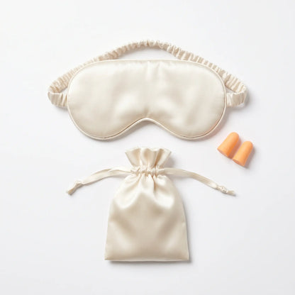 Champagne Beige DriftKit Travel Sleep Kit with soft sleep mask, earplugs, and compact pouch