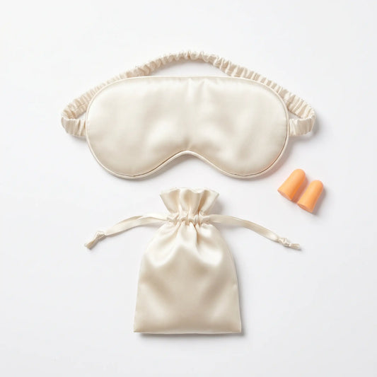 Champagne Beige DriftKit Travel Sleep Kit with soft sleep mask, earplugs, and compact pouch